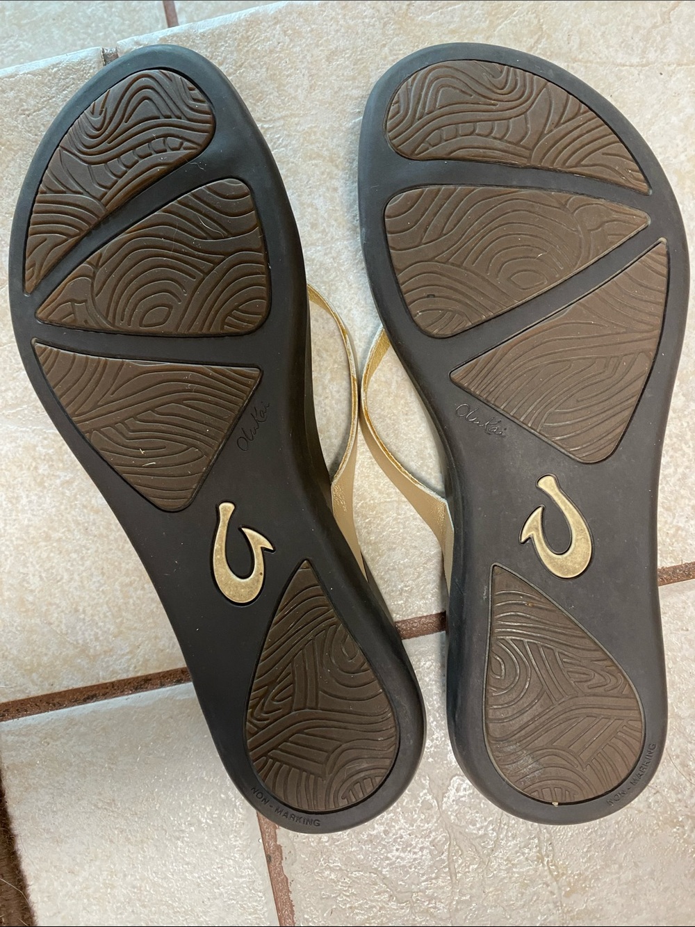 OluKai Women's Dark Brown Footbed Flip Flops with Tan/gold Straps - Picture 2 of 6